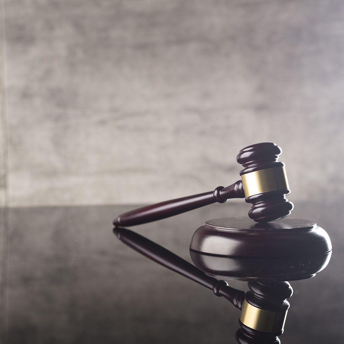 gavel with books old wooden desk